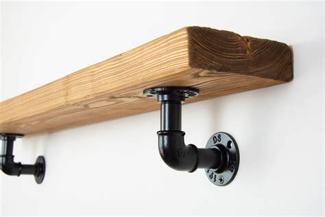 metal pipe shelf brackets|industrial pipe brackets for shelves.